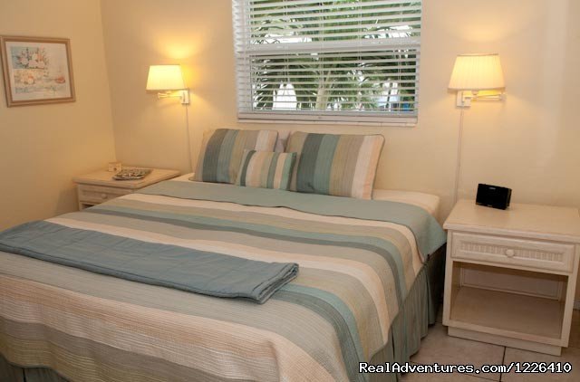 Comfortable Bedroom | Tropical Ocean View Suites at the Sea Spray Inn | Image #6/7 | 