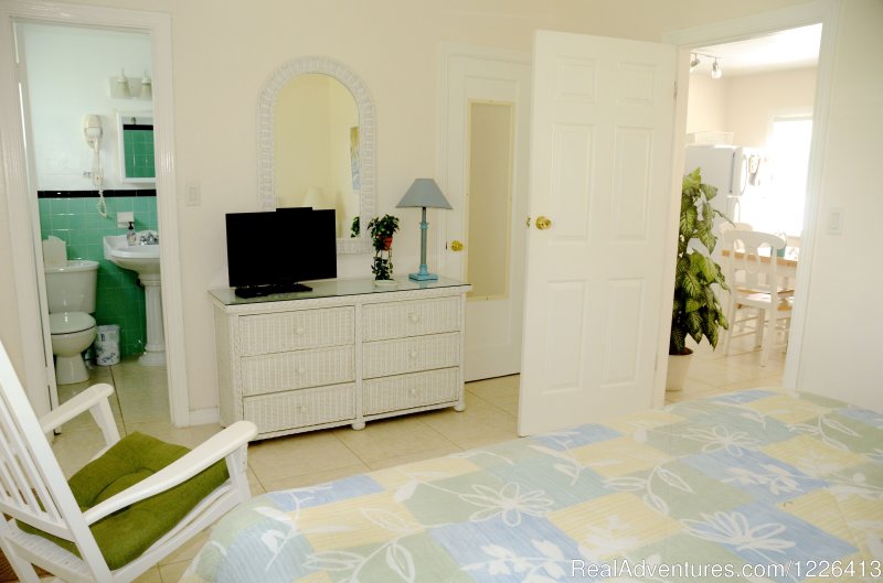 One bedroom apartments have king beds | Bahama Beach Club - Studios and 1/1 Apts | Image #7/26 | 
