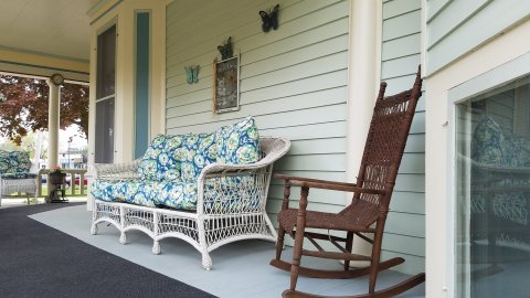 Wicker Couch And Rocker Of Front Porch