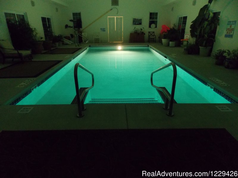 Indoor heated pool at night | Relax, Renew, Rejuvenate at Ye Olde Manor House | Image #11/16 | 