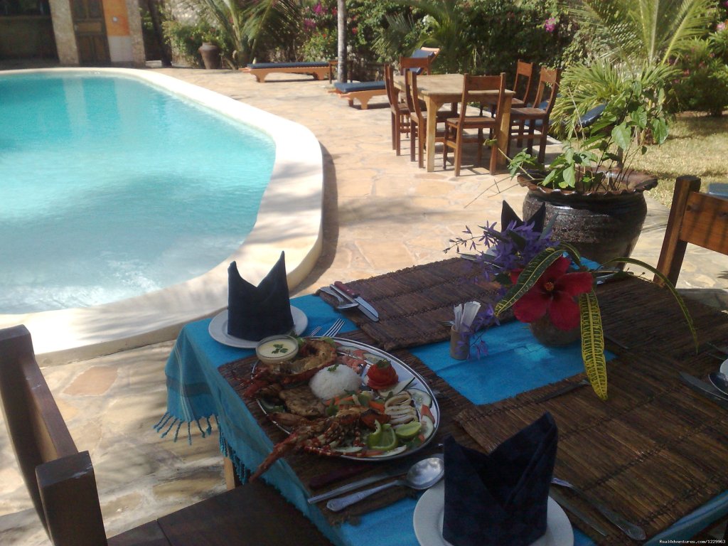Dinning by the Pool  | Unforgetable Days at Watamu Tembo Village Resort | Image #13/15 | 