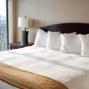 One Bedroom Harbour View Suites - Victoria King Master Bedroom