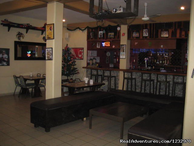 Overview of the restaurant lounge area | Backpackers Hostelling Center & Champ's Sports Bar | Image #22/23 | 