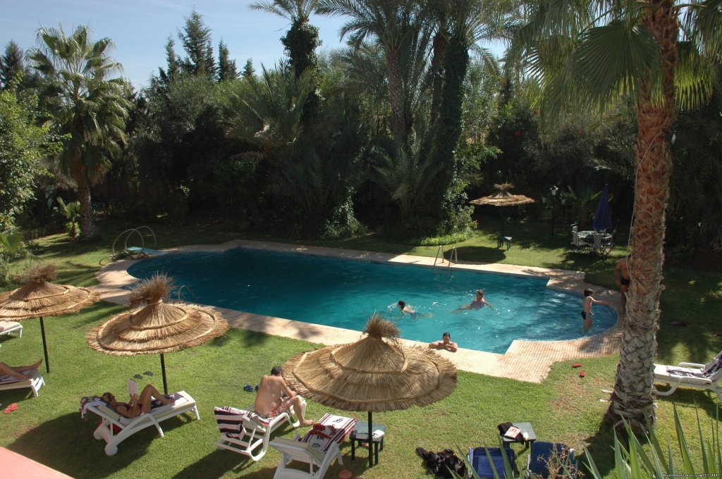 garden pool view | Villa Des 3 Golfs à Marrakech | Image #2/4 | 