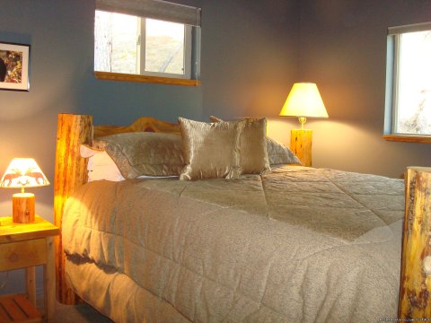 Pine Log bedroom: queen size bed, pillow top mattress