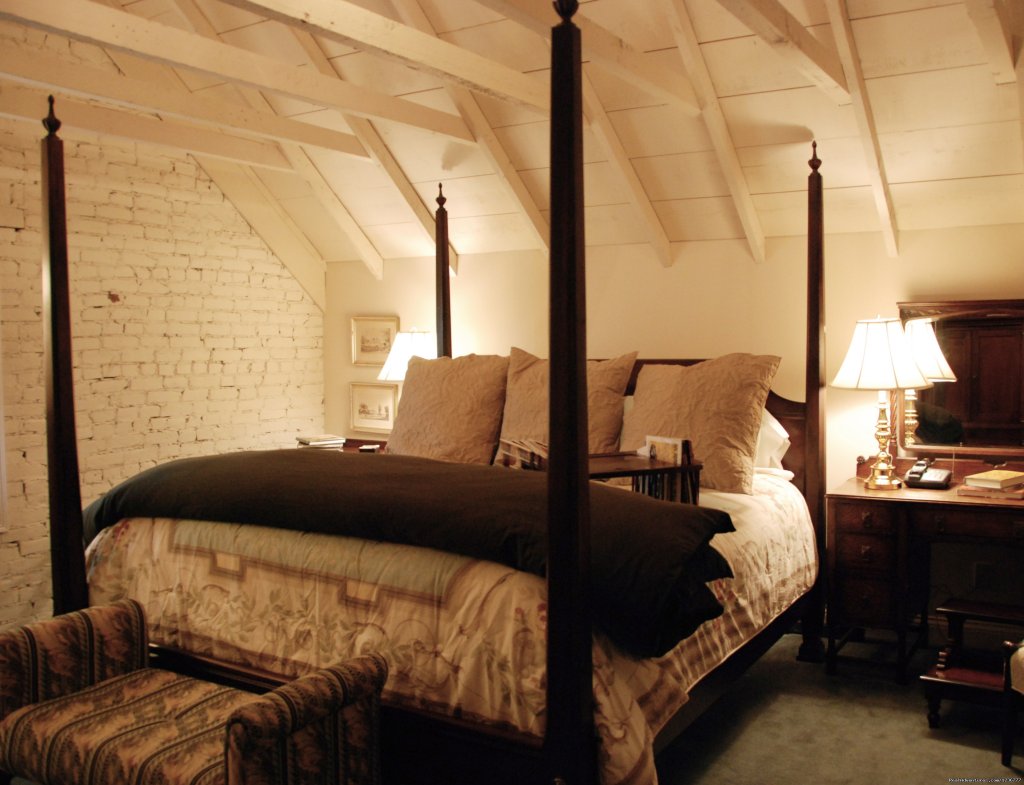 Attic Suite king bedroom in the 1200 square foot suite | Inn at Woodhaven a Romantic Bed and Breakfast i | Image #4/10 | 