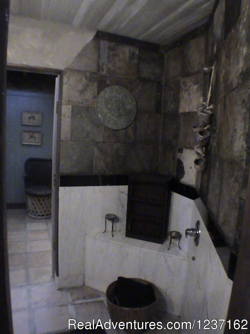 Bunkhouse Bathroom | A Wild Purple Ranch & Retreat | Image #17/22 | 