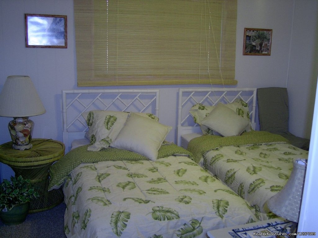 2 twin beds in 2nd bedroom | OCEAN RESORT w/Largest Pool On Island On Beach | Image #7/16 | 