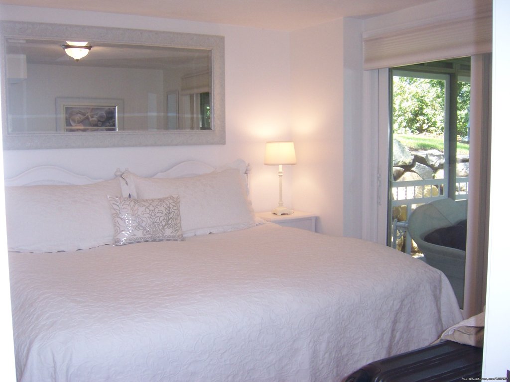 King Bedroom With Lovely Woodsy View | Kayaking & Much More... At Waters Edge Beach House | Image #11/15 | 