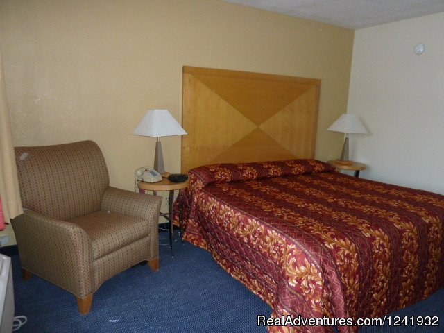 King Size Bed with Pull Out Sofa | Katahdin Inn & Suites | Image #2/11 | 