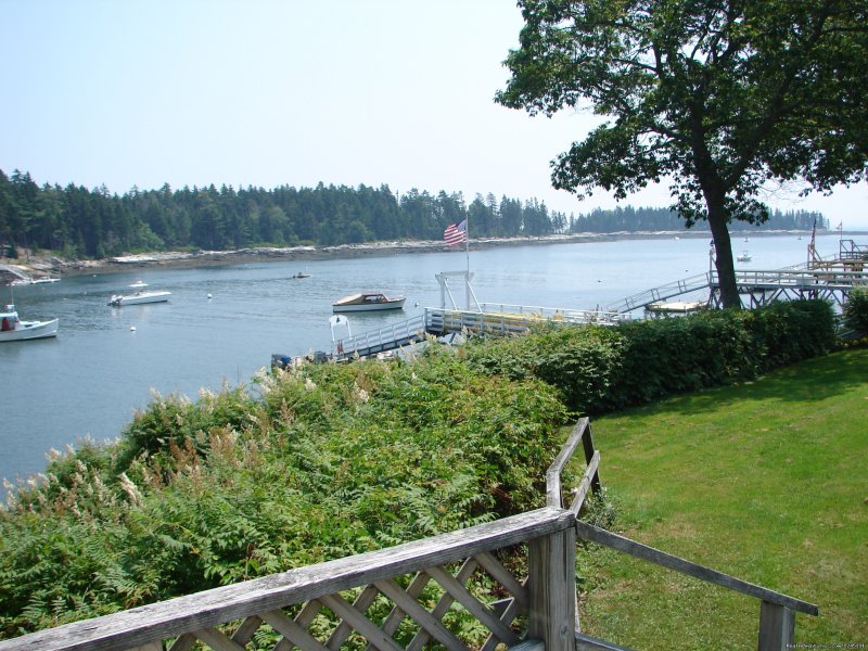 Relax on the deck. | Quiet Maine Waterfront Cottage | Image #3/15 | 