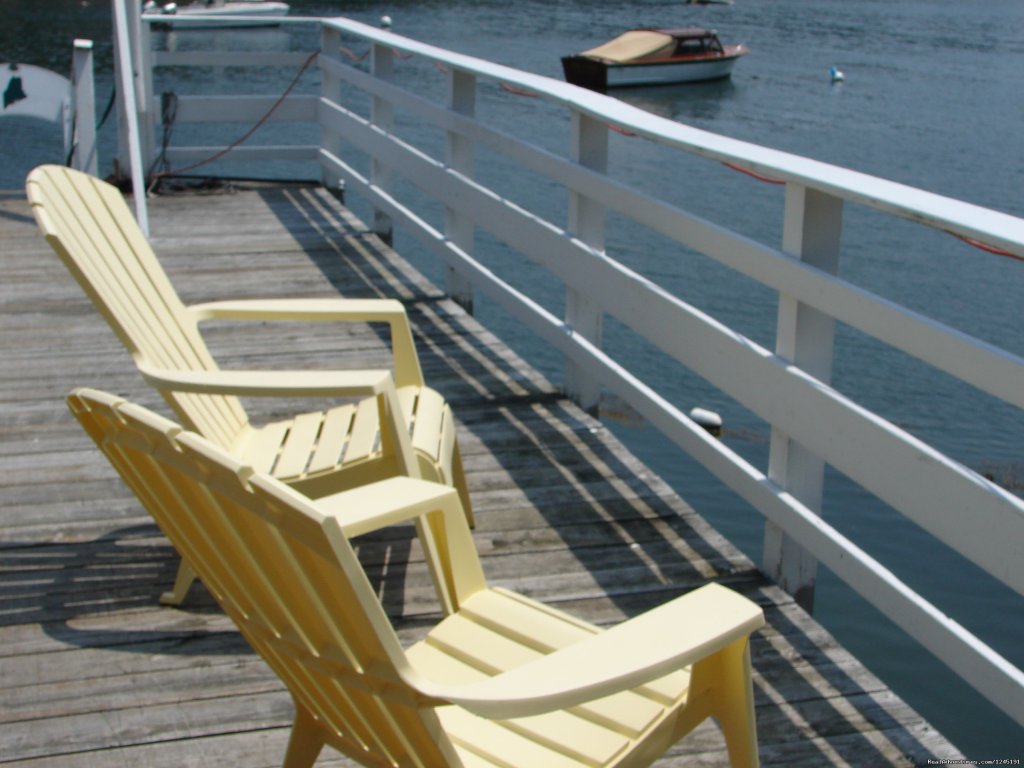 Relax on the dock. | Quiet Maine Waterfront Cottage | Image #15/15 | 