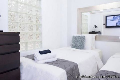 Bedroom 2 with 1 King or 2 Twins | Image #8/9 | 3 Room Art Deco Oceanfront Suite at Shelborne