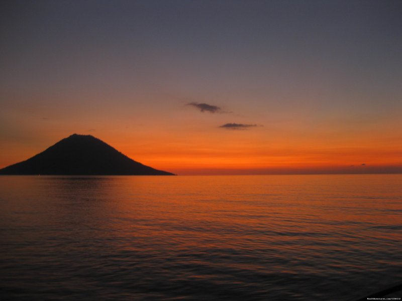 Sunset over ManadoTua | Romantic accommodation and incredible diving | Manado, Indonesia | Hotels & Resorts | Image #1/15 | 