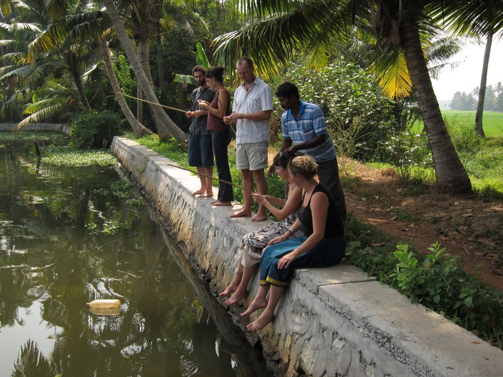 Fishing - another activity to relax you further | Eco houseboat romantic getaway in Kerala, India | Image #7/8 | 
