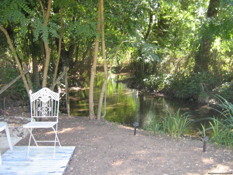 Seating area by the stream at the end of the garden | Warm irish welcime in rural France | Image #5/16 | 
