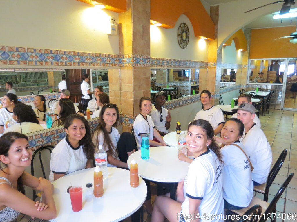 Group of students having dinner in a local restaurant | Spanish Language School And Volunteer In Honduras | Image #19/26 | 