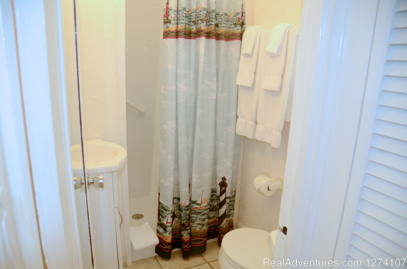 Small bathroom in king studio (no tub). | Cottages by the Ocean - Studios and 1/1 | Image #9/26 | 