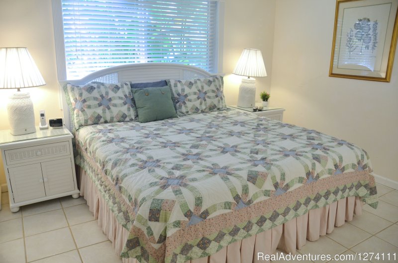 Standard size one-bedroom apartments have king beds | Sunny Place - A short walk to the beach | Image #7/26 | 
