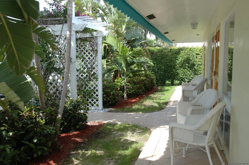 Enjoy the veranda to read a book or have morning coffee. | Pineapple Place - South Florida great getaway | Image #3/26 | 