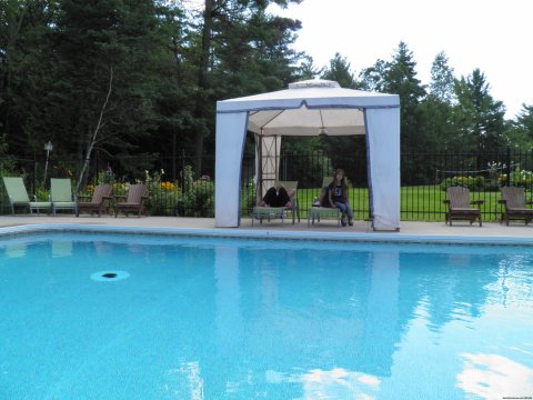 40 Foot Fresh Water Pool With Waterfall | Image #14/15 | Westwind Inn on the Lake A Four Season Resort