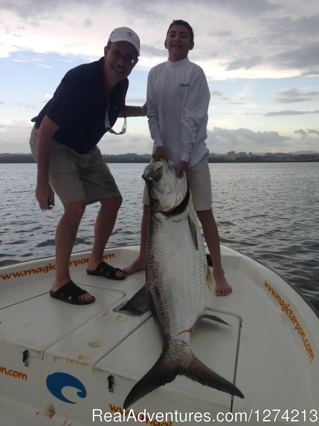 Kid with a 130 lbs Tarpon | Tarpon And Snook Fishing In San Juan | Image #9/10 | 