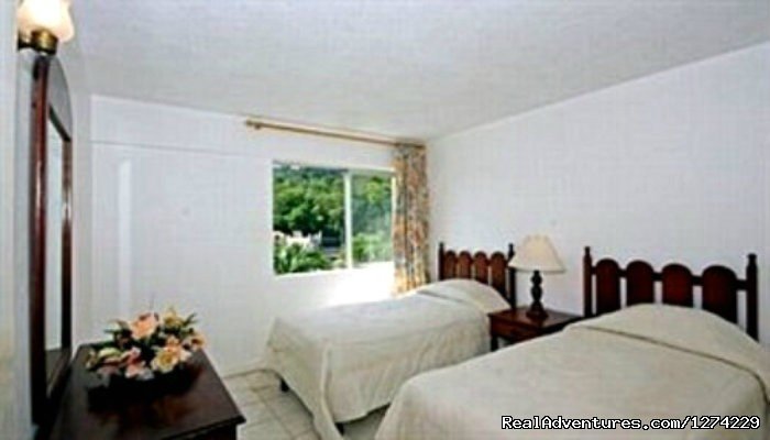 Bedroom | Ocho Rios beachfront resort condo | Image #4/6 | 
