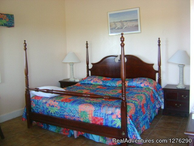 The king size bed room. | Greenwich Creek Lodge | Image #5/5 | 