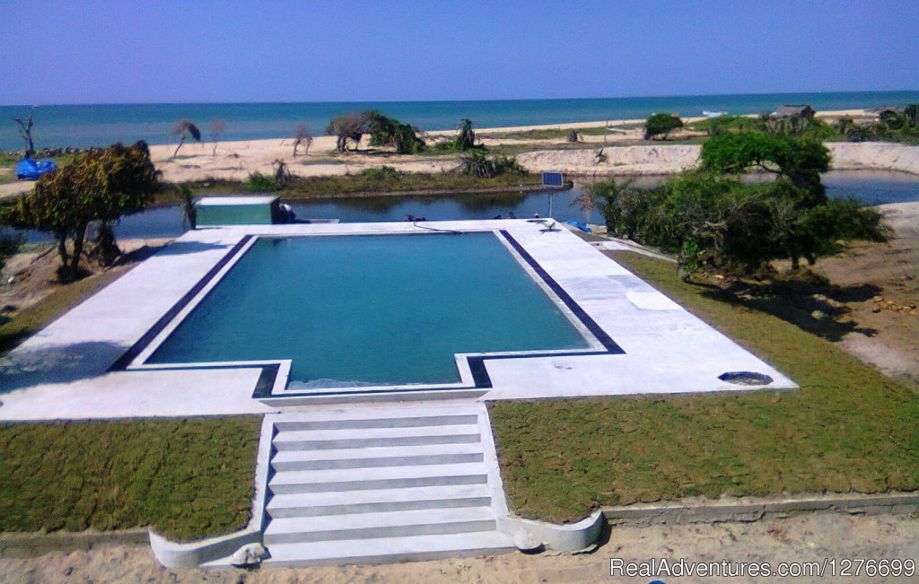 Pool and sea view from upper deck Cofee shop. | Hotel and Eco Resort with Beach chalets | Image #8/26 | 