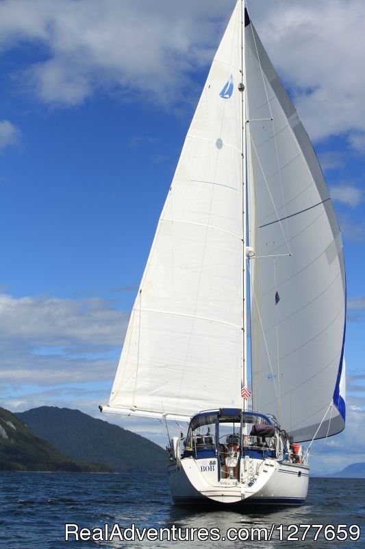 Sailboat BOB sailing wing-on-wing. | Sound Sailing- Crewed Sailboat Charters in Alaska | Image #20/21 | 