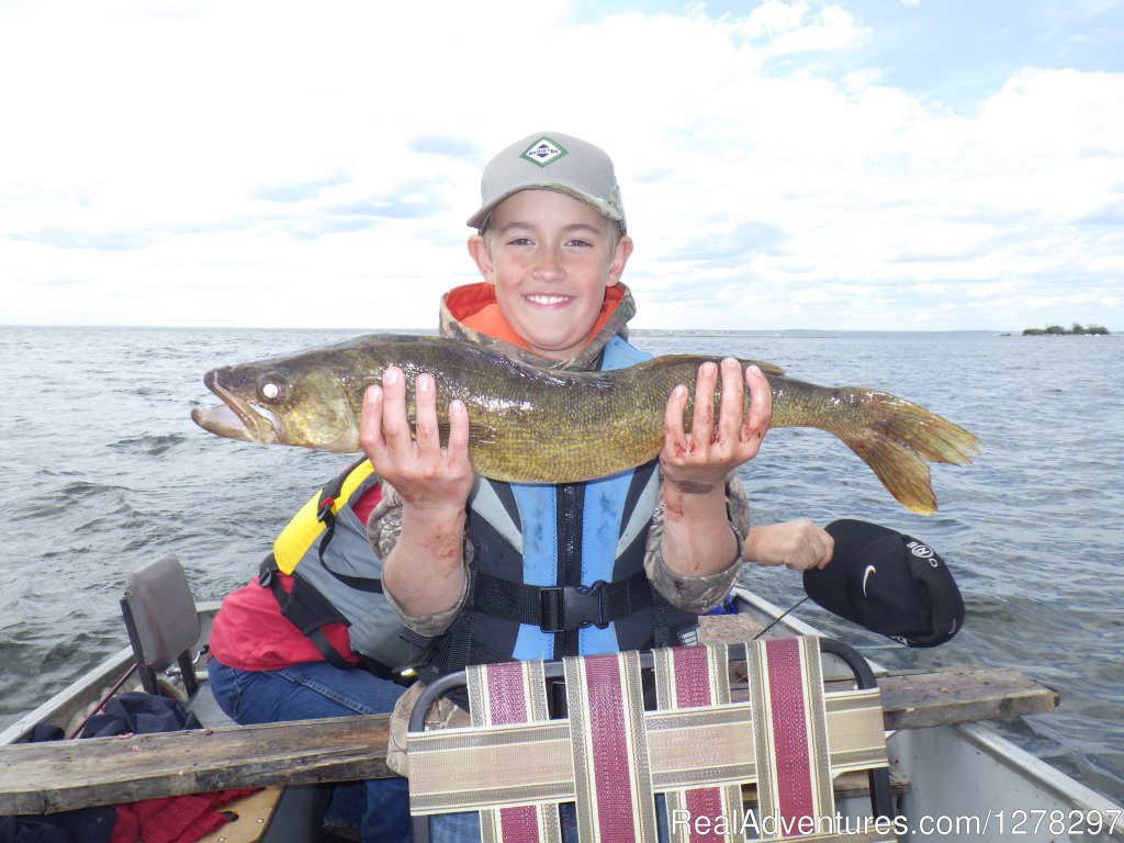 nice Walleye for this 10 yr. old | Hooked on Tapawingo Lodge | Image #3/6 | 