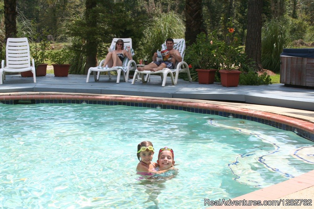 Swimming in and lounging by the pool | Splendor Farms | Image #9/12 | 
