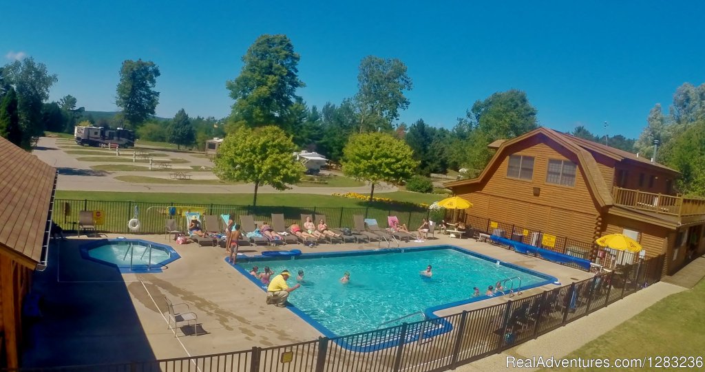 Petoskey RV & Cabin Resort heated pool and hot tub | Petoskey KOA | Petoskey, Michigan  | Campgrounds & RV Parks | Image #1/12 | 