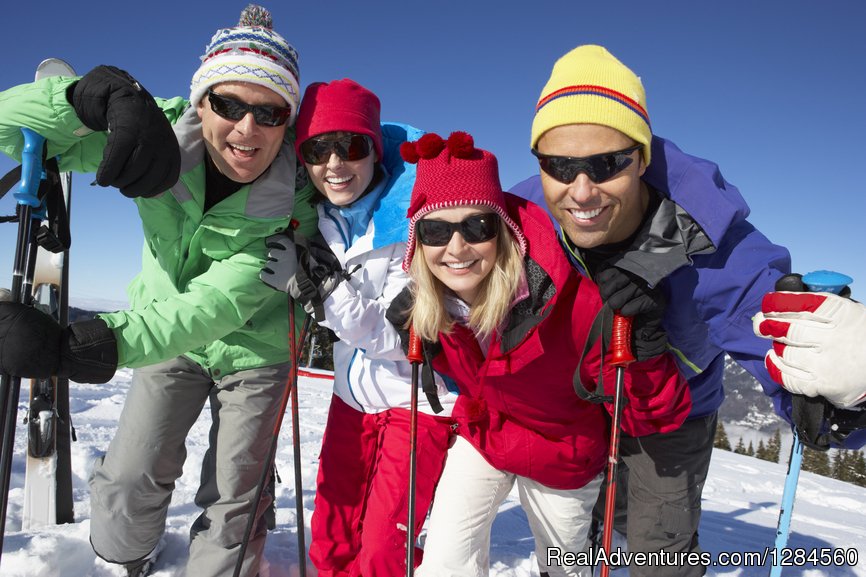Four happy friends on a singles ski trip | Single Ski Hub: Skiing and Snowboarding vacations | Doylestown, Pennsylvania  | Skiing & Snowboarding | Image #1/7 | 