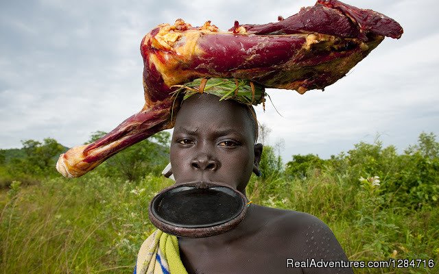 Omo Valley Woman With Lipdisc | Natural  and cultural  tour package | Addis Ababa, Ethiopia | Sight-Seeing Tours | Image #1/1 | 