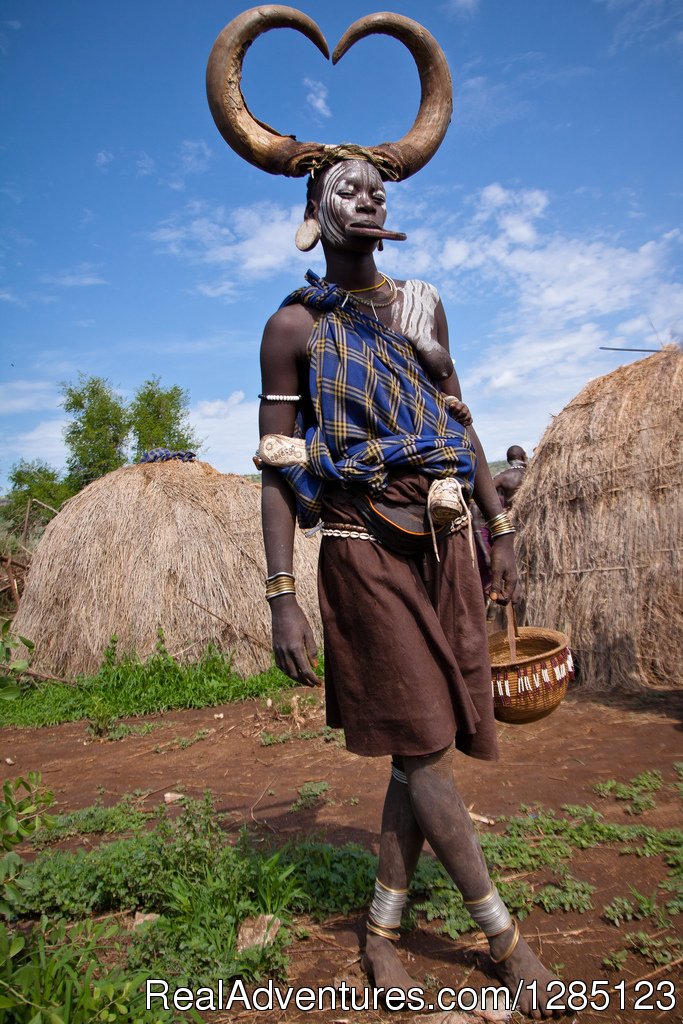 Image of Mursi woman | Luxury Ethiopia Tours with His-Cul Tour Operator | Image #2/5 | 