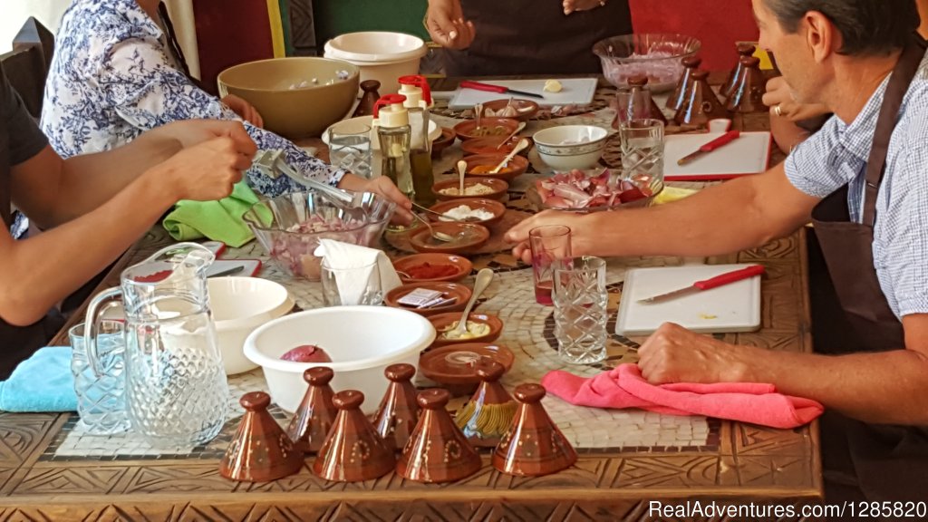 Preparing grilled chicken | Marrakech Cooking School - Daily Cooking Classes | Image #5/23 | 