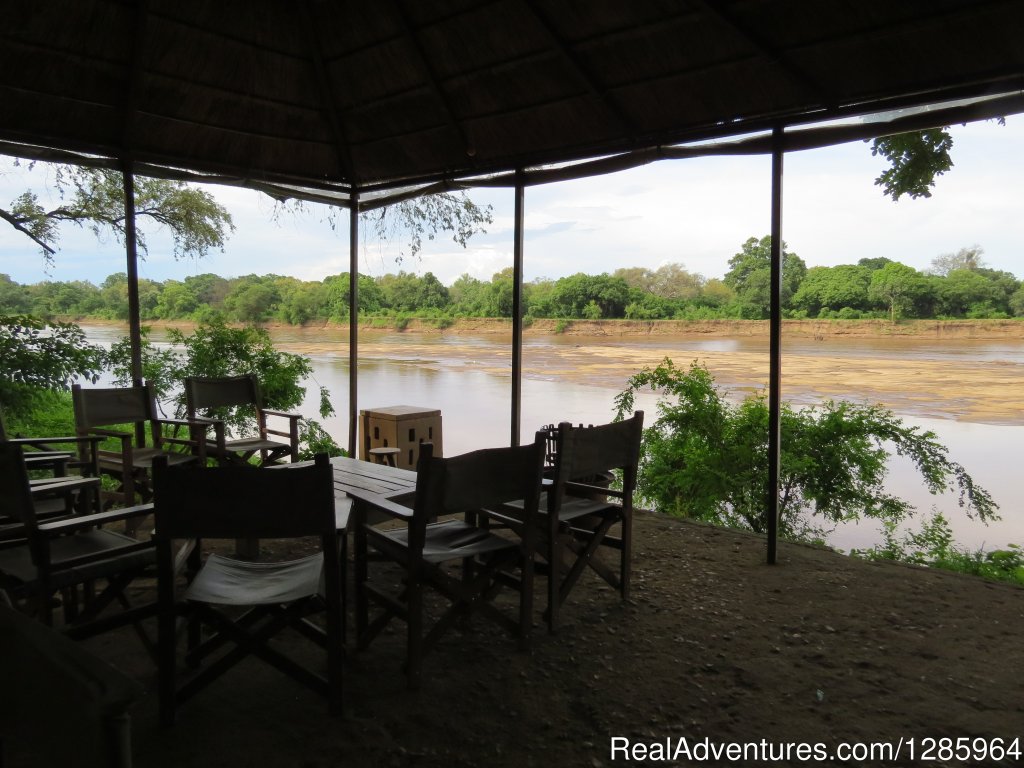 Overlooking the river from the bar | Affordable Safari Holidays at Croc Valley Camp | Image #11/22 | 