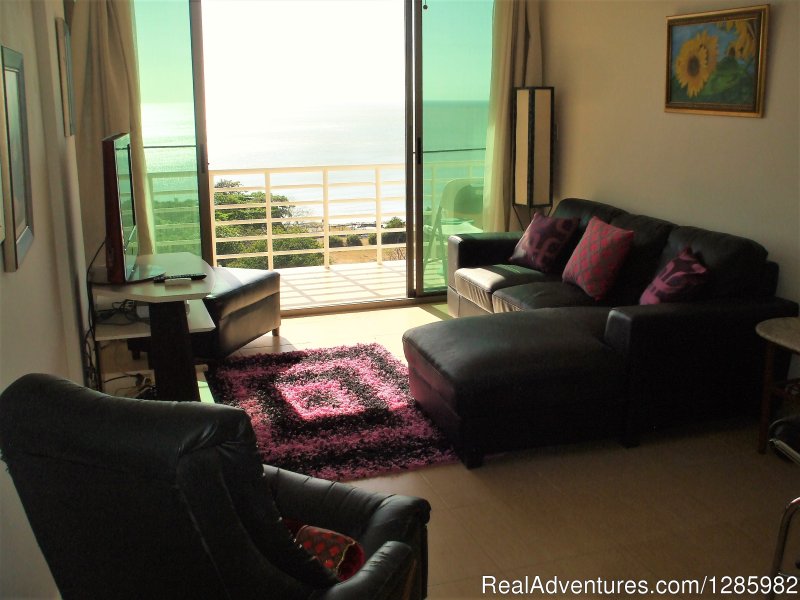Living Room with balcony overlooking Ocean | Ocean View 2 bed/2 bath apt with pool in Gorgona | Image #3/7 | 