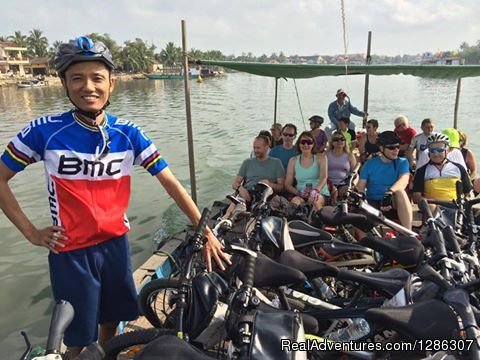 On a boat crossing the river | Easy cycling to rice farms Mekong Delta Vietnam | Image #2/4 | 